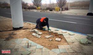 لایروبی جوی‌های آب خیابان ادیب شمالی در شهرک خاوران