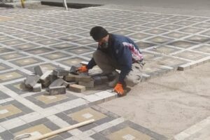 بهسازی و اصلاح کف‌های مقابل دانشکده دانشوران در خیابان رسالت