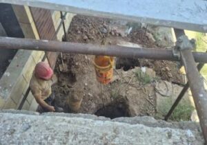 رفع مشکل آب‌گرفتگی در آرامستان گلزار شهدای ملک‌عباسی با حفر چاه جذبی